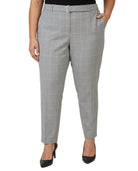 Calvin Klein gray checkered pants worn by a person on a white background
