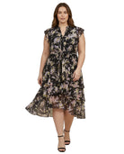 Woman wearing a Calvin Klein floral dress on a white background