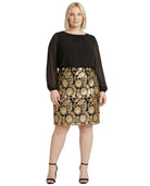 Woman wearing a Calvin Klein black and gold floral dress on a white background