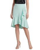 Light blue Calvin Klein skirt worn by a person on a white background