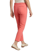 Coral Calvin Klein pants worn by a person on a white background