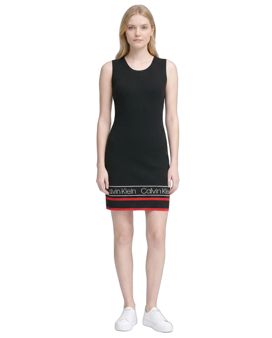 Black sleeveless dress with red band and Calvin Klein logo worn by a model on a white background