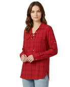 Woman wearing a red plaid Calvin Klein shirt on a white background