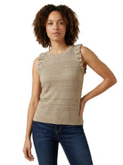 Front view of a woman modeling the INC International Concepts neutral beige sleeveless knit sweater featuring pleated shoulder ruffle trim and a crew neck.