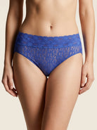 Cropped view of a woman modeling Wacoal Halo lace hi-cut brief underwear in royal blue with an intricate floral stretch lace design.